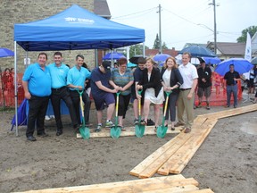 People were out in a crowd to witness the groundbreaking of the new Habitat for Humanity build on Alma Street in St. Thomas on Monday afternoon. Habitat for Humanity Heartland Ontario CEO Brian Elliot, left; Greg Shillington, RBC branch manager; Chris Zwicker, chair of Habitat for Humanity; Heath Wilson; Tina Wilson; Reed Wilson; MP Karen Vecchio; Heather Jackson, St. Thomas mayor; and MPP Jeff Yurek.
(Laura Broadley/Times-Journal)