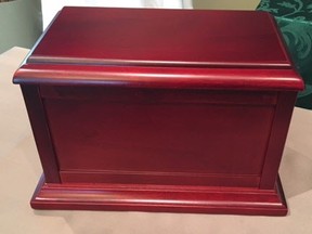 A cherrywood chest containing the ashes of Mary Myers was stolen from the deceased woman's Strathcona County residence on the evening of July 8, 2017.