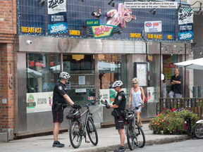 Ottawa police have assigned 36 officers to be part of a bike and foot patrol project that will see some of that group dedicated to the downtown core. WAYNE CUDDINGTON / POSTMEDIA