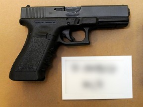 Officers from the Alberta Law Enforcement Response Team's (ALERT) Organized Drug and Gang Unit seized this Glock 22 .40-calibre handgun from an Edmonton home as well as $240,000 worth of cannabis products, $36,000 in cash and a 2004 Mercedes-Benz sedan on June 29, 2017.