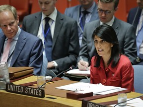 United States U.N. Ambassador Nikki Haley, right, speaks during United Nations Security Council meeting on North Korea's latest launch of an intercontinental ballistic missile, Wednesday July 5, 2017 at U.N. headquarters. (AP Photo/Bebeto Matthews)