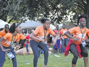 The Neema Children?s Choir shared an energetic performance of dancing, drumming and singing at Sunfest on Sunday evening. The  Ugandan group is composed of children aged seven to 16 years. (The London Free Press)