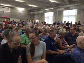 Hundreds of people fill a room in the Richelieu-Vanier Community Centre for the public consultation organized over a Salvation Army development plan for an emergency shelter and social-services centre at 333 Montreal Rd.