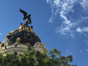 Topped by a statue of the winged goddess Victoria, the Metropolis Building at Alcala Street and Gran Via is one of Madrid's most famous edifices. The area has a wealth of beautiful early 20th century architecture. ROBIN ROBINSON/TORONTO SUN