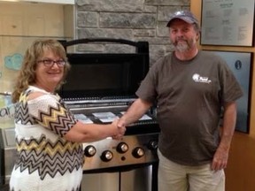 Bev Boswell (left), executive director of Bruce Peninsula Health Services Foundation, congratulated Darrell Pond on his win of a new barbecue through the Foundation’s “Live Your Dream” lottery at the Wiarton Hospital, June 30, 2017. Submitted photo