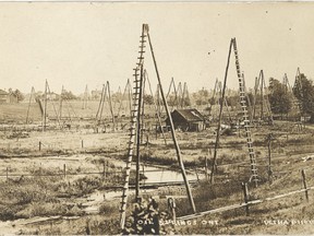 This photograph of three-pole oil derricks in Oil Springs is from the collection of the Oil Museum of Canada. It was taken by Lambton County-born photographer Louis Pesha, who worked for a time in Oil Springs and then went on to become a successful post card photographer in Michigan. (Handout)