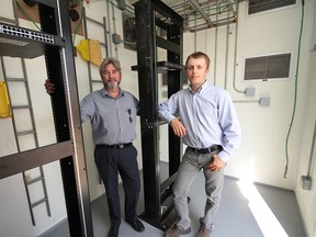 CommStream CFO Don Walker (left) and Chief Technical Officer Vlad Lyseyko inside one of the communications centres they will install in 10 remote Manitoba First Nations communities to provide 17,000 residents in 2,000 homes with latests high speed internet. 
Donna Maxwell/Handout