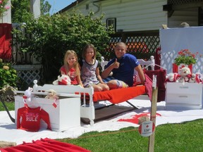 Suzie Fitzsimons’ kids, Connor, Montanna and Shayla Ward, created the winning “outdoor” display, set up at their home on Isaac Street.