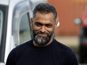 British Moazzam Begg leaves Belmarsh Prison in south London, after his release, Wednesday, Oct. 1, 2014.(THE CANADIAN PRESS/AP, Lefteris Pitarakis)