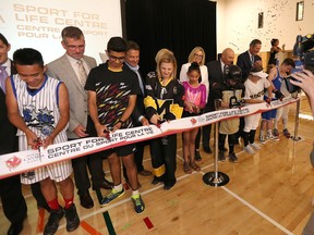Dignitaries and young athletes take part in the official ribbon cutting at the grand opening event for the Sport Manitoba Jeux du Canada Games Sport For Life Centre in Winnipeg on Tuesday, July 11, 2017. JASON HALSTEAD/Courtesy of Sport Manitoba