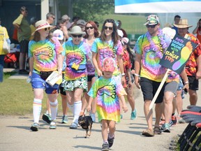 Team Sole Mates makes its first lap of Relay For Life at Rotary Park on July 8. Team Anchor 5 was the top fundraiser at over $12,000. (Peter Shokeir | Whitecourt Star)