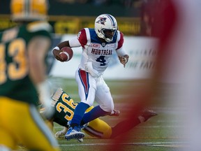 Montreal Alouettes quarterback Darian Durant runs against the Edmonton Eskimos during CFL action on June 30, 2017. (Greg Southam/Postmedia)