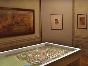 This photo made available by the Auschwitz Museum on Wdnesday July 12,2017 shows a model of a plan the German Nazis were making for the enlargement of the Auschwitz death camp. Made by inmates, it is one among some 200 drawings and other pieces of art now on display at a "Face to Face. Art in Auschwitz" exhibition of art by the inmates at the Szolayski house in Krakow, Poland. (Bartosz Bartyzel/Auschwitz Museum via AP)