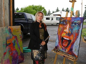 Artist Chris Riley had her vehicle (silver 2010 Ford Flex) stolen from the driveway (behind her) on the acreage where she lives near Spruce Grove, Alberta. In the vehicle were approximatley one hundred pieces of her artwork which she had just finished displaying at the Whyte Avenue Art Walk in Edmonton. The theft occurred in the early monrning hours on Monday July 10, 2017. (PHOTO BY LARRY WONG//POSTMEDIA)
