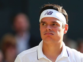 Canada's Milos Raonic reacts after a point against Switzerland's Roger Federer during their men's singles quarter-final match on the ninth day of the 2017 Wimbledon Championships at The All England Lawn Tennis Club in Wimbledon, southwest London, on July 12, 2017.(DANIEL LEAL-OLIVAS/AFP/Getty Images)