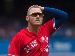 Toronto Blue Jays third baseman Josh Donaldson makes his way back to the dug out at the end of first inning American League MLB baseball action against the Houston Astros in Toronto on July 9, 2017. (THE CANADIAN PRESS/Chris Young)