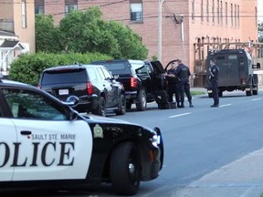 Police respond to a man barricaded at Algonquin Hotel on July 6. Cindy Ougler for Postmedia Network