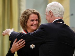 Governor General David Johnston invests Julie Payette from MontrŽal, Quebec, as an Officer of the Order of Canada during a ceremony at Rideau Hall, in Ottawa on Friday, September 16, 2011. (JOHN MAJOR/QMI AGENCY)