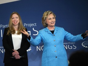 Hillary Rodham Clinton shares the stage with her daughter Chelsea Clinton while speaking at the Clinton Foundation's No Ceilings: The Full Participation Project at the Lower Eastside Girls Club on April 17, 2014 in New York City.