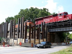 Construction is underway to rebuild a Canadian Pacific Railway bridge, which runs over Wharncliffe Road, just north of Oxford Street. The work is to continue in stages and may run through until the end of 2018. A detour for the train is being built alongside the existing rail bridge. After the bridge is completed, the road will be widened to four lanes. (MIKE HENSEN, The London Free Press )