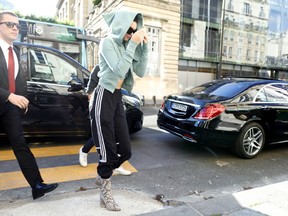 Kendall Jenner hides her face while out and about in Paris, France on July 1, 2017. (Credit: WENN.com)