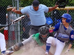 Kingston Colts' Dante Cifala steals home, beating the tag from East Nepean Eagles catcher Jacob MacDonald as umpire Ian Edmunds makes the "safe" call.