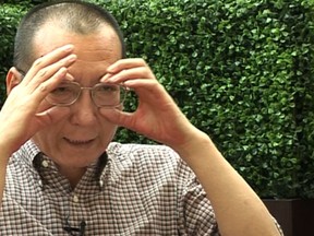 In this image taken from June 3, 2008, video footage by AP Video, Liu Xiaobo speaks during an interview before his detention in Beijing, China. (AP Video via AP)