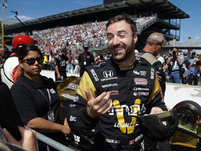 James Hinchcliffe smiles during qualifications for the Indianapolis 500 at Indianapolis Motor Speedway, Sunday, May 21, 2017, in Indianapolis. (AP Photo/Darron Cummings)