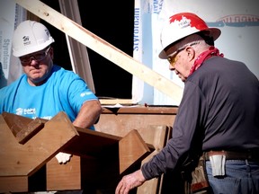 Former U.S. President Jimmy Carter helps build homes for Habitat for Humanity in Winnipeg on Thursday, July 13, 2017. Stacia Franz/Manitoba Government/THE CANADIAN PRESS/HO