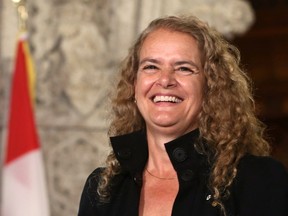 Former astronaut, and Governor General designate, Julie Payette, smiles on Parliament Hill, in Ottawa, after she was introduced on Thursday July 13, 2017. THE CANADIAN PRESS/Fred Chartrand