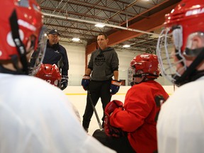 Jason Miller/The Intelligencer
Prince Edward-Hastings MPP Todd Smith (left) stands next to Patrick Brown, Ontario PC Leader, who made a stop in Belleville, Thursday, during his province-wide tour to drum up support before the 2018 election. Brown took to the ice at Rhino Sports and Playland to run some drills with the Quinte Red Devils.
