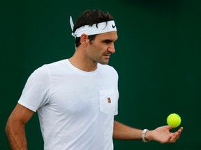 Switzerland’s Roger Federer attends a practice session at in Wimbledon on July 13, 2017. (DANIEL LEAL-OLIVAS/Getty Images)