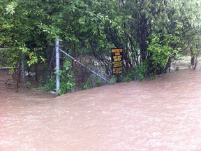 Floodwaters from a nearby creek running into Alberta's Lesser Slave Lake inundate a contaminated site near Faust, Alta. in this undated handout photo. The Alberta government is considering cleaning up a former wood-preserving site along one of the province's biggest lakes and turning the adjacent land into a day-use area. THE CANADIAN PRESS