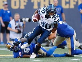 Toronto Argonauts' Martese Jackson returns a Winnipeg Blue Bombers' kick for the touchdown during the first half of CFL action in Winnipeg on July 13, 2017. (THE CANADIAN PRESS/John Woods)