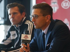 Toronto FC general manager Tim Bazbatchenko (R) and coach Greg Vanney (L) have signed new deals. (Jack Boland, Toronto Sun)