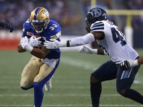 Winnipeg Blue Bombers RB Andrew Harris scores his second rushing touchdown of the game against the Toronto Argonauts during CFL action in Winnipeg on Thurs., July 13, 2017. Kevin King/Winnipeg Sun
