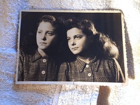 Londoner Barbara Kaufman, 81, holds the old photo she dug out amid a mystery involving the Holocaust, the Beatles and an old Free Press story. (PATRICK MALONEY, The London Free Press)