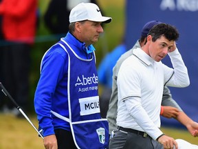 A dejected Rory McIlroy of Northern Ireland leaves the 18th green after finishing his second round during Day Two of the AAM Scottish Open at Dundonald Links Golf Course on July 14, 2017 in Troon, Scotland. (Tony Marshall/Getty Images)