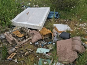 Discarded furniture sits in a ditch on Neil Road, along the Loyalist Township-Kingston boundary on Thursday, July 13, 2017. The site has become an unofficial dump with furniture and construction waste piling up.
Elliot Ferguson/The Whig-Standard/Postmedia Network