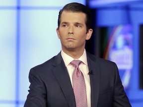 Donald Trump Jr. is interviewed by host Sean Hannity on his Fox News Channel television program, in New York Tuesday, July 11, 2017.  (AP Photo/Richard Drew)