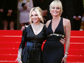 US singer Madonna (L) and actress Sharon Stone pose as they arrive at the Festival Palace during the 61st Cannes International Film Festival on May 21, 2008 in Cannes, southern France.(VALERY HACHE/AFP/Getty Images)