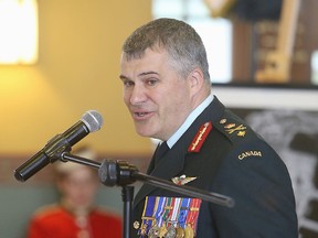 The new commandant of the Royal Military College of Canada Brig.-Gen. Sebastien Bouchard speaks at a change of command ceremony in Kingston, Ont. on Friday, July 14, 2017. 
Elliot Ferguson/The Whig-Standard/Postmedia Network