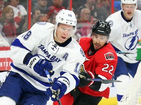 Chris Kelly of the Ottawa Senators hooks Ondrej Palat of the Tampa Bay Lightning at Canadian Tire Centre in Ottawa October 22, 2016. (Jean Levac/Postmedia Network)