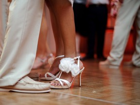 A couple dances on a dance floor at a wedding reception in this stock photo. (Getty Images)