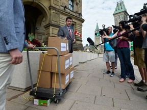 The Canadian Taxpayers Federation's federal director, Aaron Wudrick, delivered a "no money for Omar Khadr" petition, signed by 133,000 Canadians, to Parliament Hill on Thursday, July 13, 2017. (supplied photo)