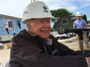 Former U.S. president Jimmy Carter takes a break from building Friday, July 14, 2017, in Winnipeg on last day of Habitat for Humanity project. TOM BRODBECK/Winnipeg Sun/Postmedia Network