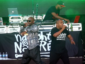 Naughty by Nature, made up of Treach, Vin Rock and DJ Kay Gee (rear) perform on Friday July 14, 2017 at Rock the Park music festival. (Mike Hensen/The London Free Press)