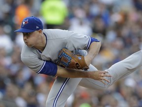Toronto Blue Jays starter Aaron Sanchez watches a pitch during the third inning of a baseball game against the Detroit Tigers, Friday, July 14, 2017, in Detroit. (AP Photo/Carlos Osorio)