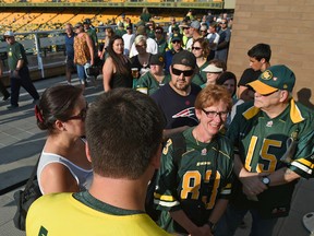 Long lineups for the 50/50 draw of which over $80,000 is being carried over from the last game at the Edmonton Eskimos vs Ottawa Redblacks game at Commonwealth Stadium in Edmonton, July 14, 2017. Ed Kaiser/Postmedia
