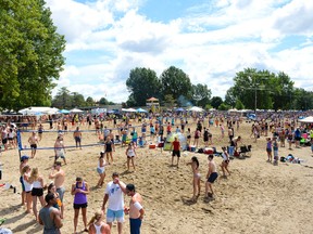 Players participate in 34th edition of HOPE Volleyball Summeriest held at Mooney's Bay in 2016. (James Park)